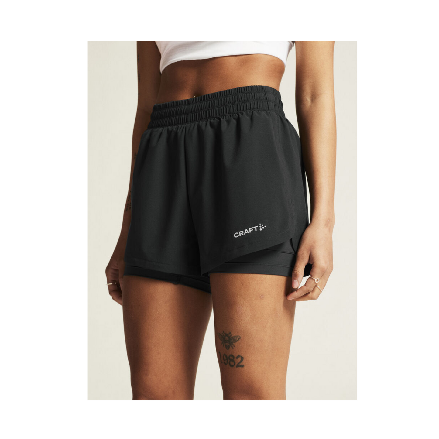 Damen-Shorts CRAFT Adv Essence 2-in-1 von Haidersport, sportlich und bequem, mit elastischem Bund und atmungsaktivem Material.